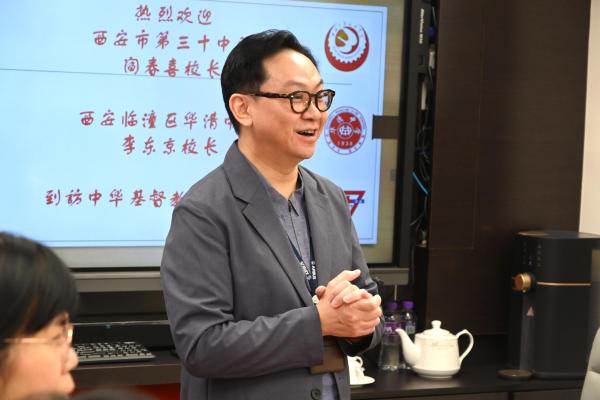 Principal Yan Chunxi from Xi'an No. 30 Secondary School visited Ching Chung