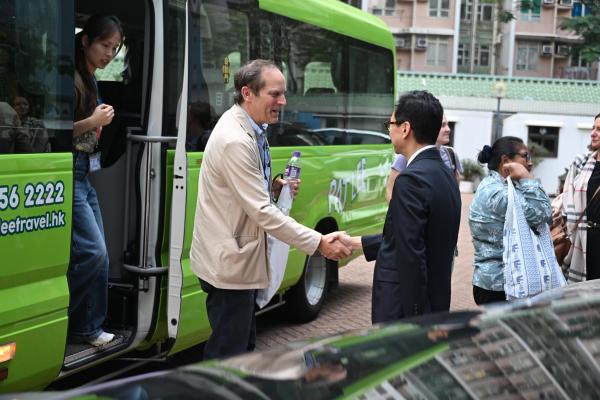 Welcome World YMCA Executive Committee Members to Chinese Y.M.C.A. Secondary School