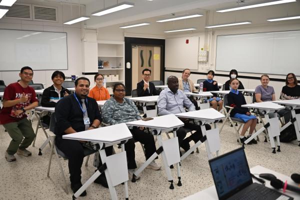 Welcome World YMCA Executive Committee Members to Chinese Y.M.C.A. Secondary School